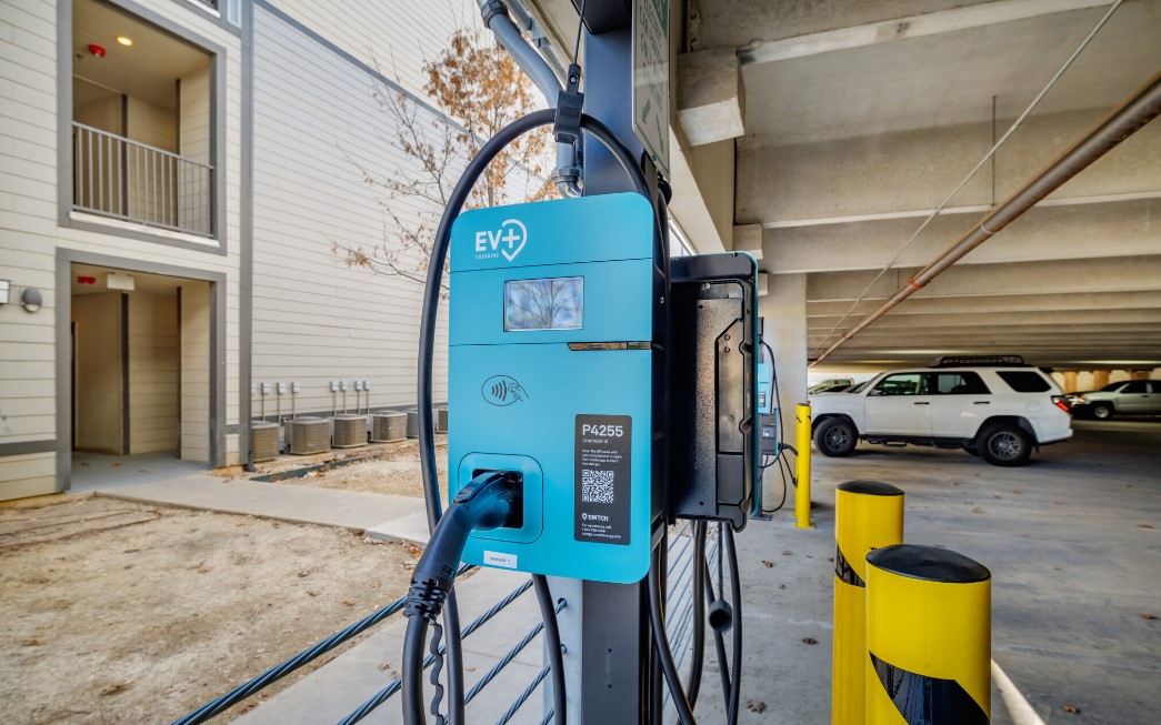 Commercial parking facility with EV charging stations for employees and fleet vehicles